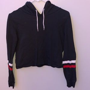 black, red, and white cropped hoodie